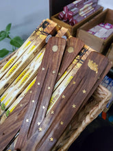 Load image into Gallery viewer, Wooden Incense Holder for Sticks with Inlays of Brass stars and Totem 10 inches Long (specify Elephant or sun)
